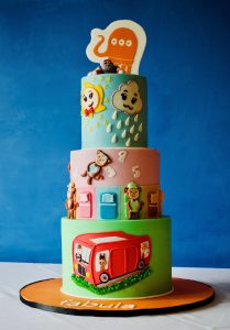 The colourful toy themed three tier BlogOn cake.