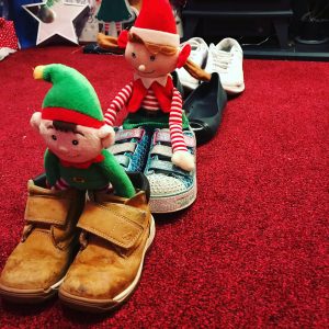 Elf on the shelf ideas: line up all the shoes into a train