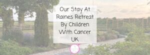 A garden scene with trees, plants, and a wooden fence, overlaid with text: Our Stay At Raines Retreat By Children With Cancer UK and a small pink logo at the bottom centre.